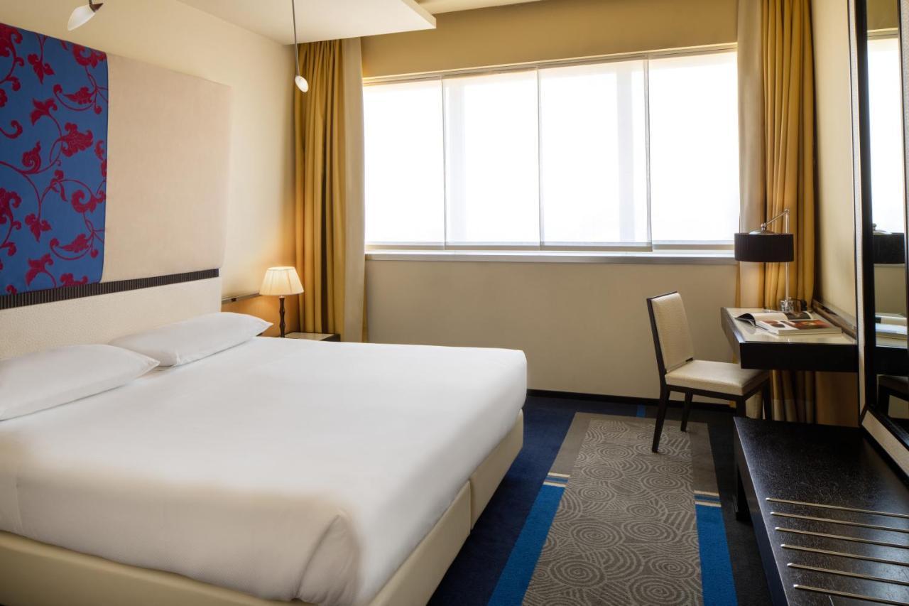 Una Hotels Malpensa Черро Маджиоре Экстерьер фото